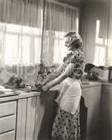 Woman making homemade orange juice