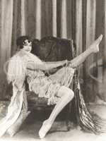 Flapper rolling up stockings