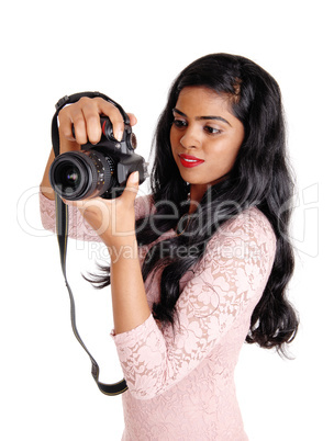 Beautiful woman taking pictures.