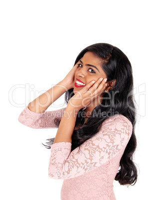 Happy Indian woman with long hair.