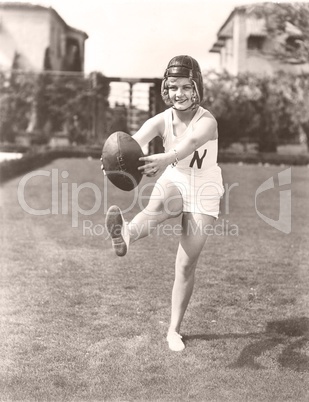 Woman playing football