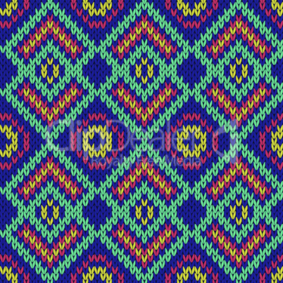 Ornate ethnic knitting motley seamless pattern mainly in blue hues