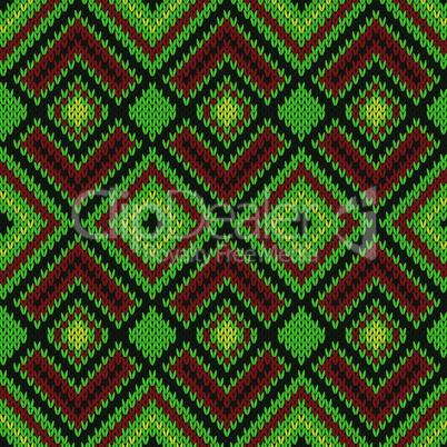 Ornate ethnic knitting seamless pattern mainly in green color
