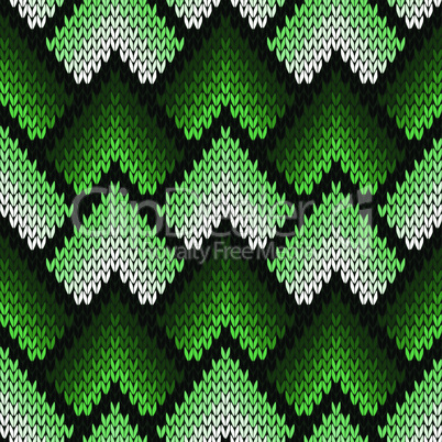 Abstract ornate knitting seamless pattern in green hues