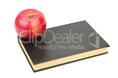 books and apple isolated on white background