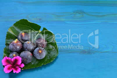 Figs and blue wood background