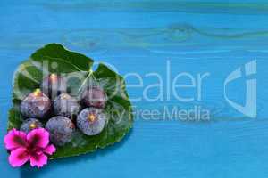 Figs and blue wood background