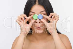 Woman with container for contact lenses