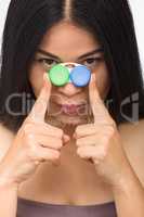 Woman with container for contact lenses