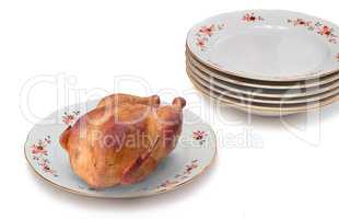 Delicious fried chicken on white ceramic dish