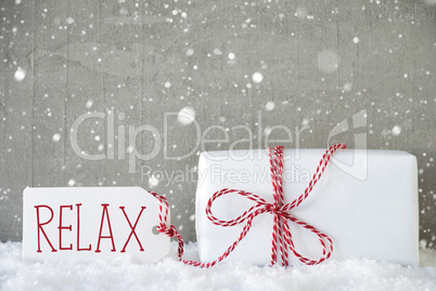 Gift, Cement Background With Snowflakes, Text Relax