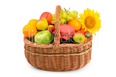 a set of healthy food products in a wicker basket isolated on wh