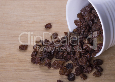 Dark raisins on a table
