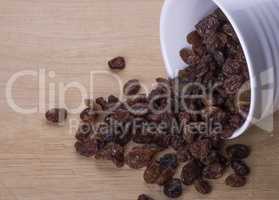 Dark raisins on a table