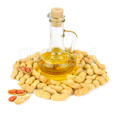 peanuts and oil in bottle isolated on white background