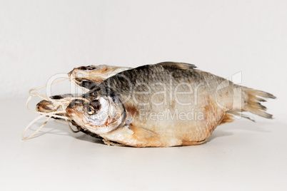 Dry fish isolated on white background