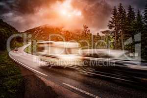 Caravan car travels on the highway.