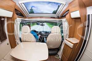 Man driving on a road in the Camper Van