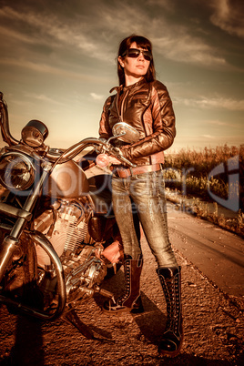 Biker girl and motorcycle