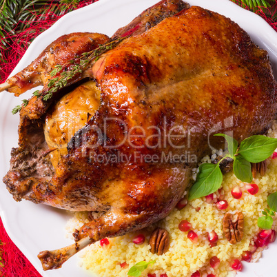 Duck with millet and pomegranate