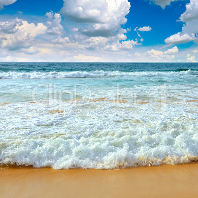 Ocean waves and blue sky