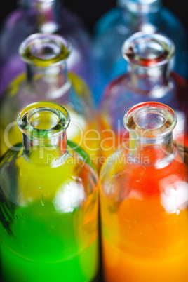 Apothecary, laboratory bottles with colored liquid