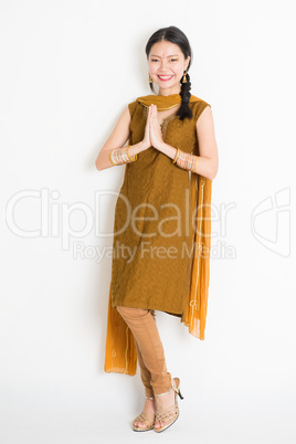 Indian Chinese woman greeting