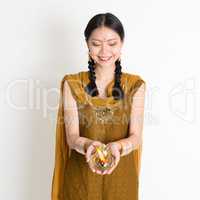 Girl holding oil lamp light