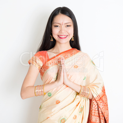 Woman with Indian greeting pose