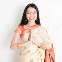 Woman with Indian greeting pose