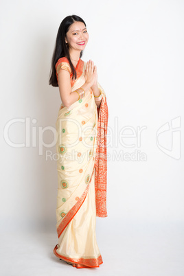 Woman with greeting pose