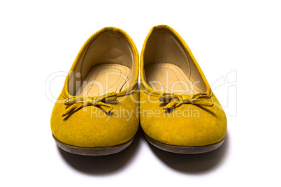 yellow female shoes on a white background