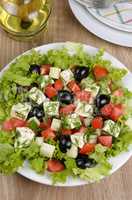 Vegetable salad with feta and olives