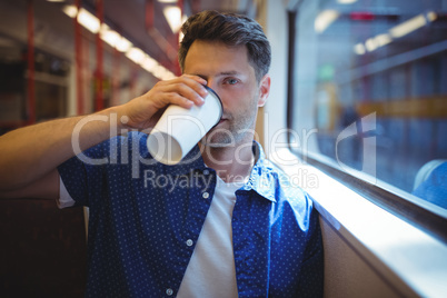 Handsome man drinking coffee