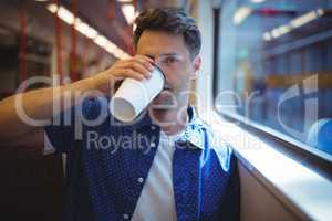 Handsome man drinking coffee