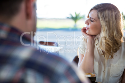 Woman sitting in coffee shop