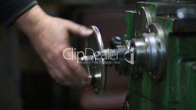 Hand steering adjustable wheel on lathe machine