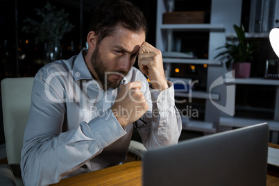 Businessman working on laptop