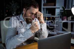 Businessman working on laptop