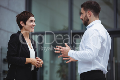 Businesspeople interacting with each other