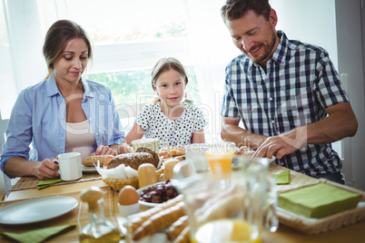 Happy family having breakfast Happy family having breakfast