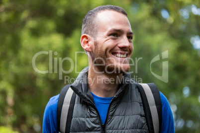 Male hiker hiking in forest