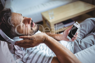 Man listening to music on headphone