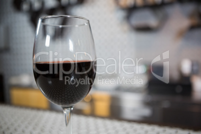Glass of red wine on counter