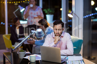 Businessman working on laptop