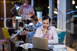 Businessman working on laptop