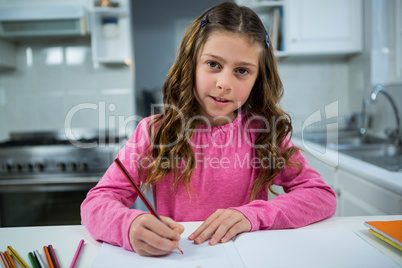 Girl doing her homework Girl doing her homework