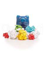 Colorful crumpled paper with a big piggy bank
