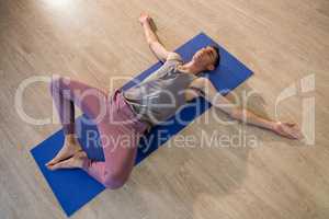 Man in yoga corpse pose