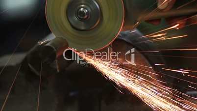 Close up metal sawing with circular blade